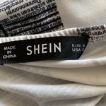 SheIn Newspaper print bodycon fitted mini dress white black Small Photo 10