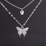 Delicate Silver Butterfly Pendant Necklace Photo 3
