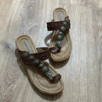 Minnetonka | Sasha Brown Flats Slide Sandals Photo 0