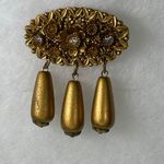 Vintage celluloid float dangle gold tone brooch Photo 0