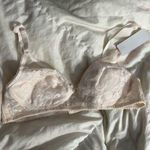 Triumph light pink Lacey 75B bra Size undefined Photo 0
