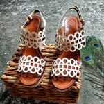 Tory Burch Nori Laser-Cut 115MM Wedge Sandal in Ivory Photo 1