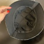 None Reversible bucket hat daisies print/solid black. NWOT Photo 5