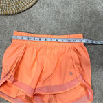 Athleta Mesh Racer Run Mid Rise 4” Shorts Pull On Running in Orange Size XXS Photo 10