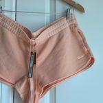 SKIMS  French Terry Short Short in Cantaloupe, Size Medium Photo 6