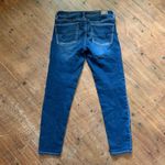 American Eagle  distressed dark wash 2 long jegging crop jeans Photo 2