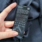 Y.A.S. • Cisley V Neck A Line Dress black cap sleeve lbd fit & flare ASOS Photo 9