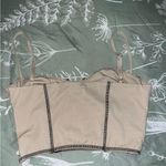 Princess Polly  tan crop top with black seems outlining Photo 2