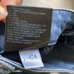 Uniqlo  jeans size 27 skinny tapered mid rise ultra stretch Photo 7