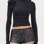 LIONESS  top Photo 0