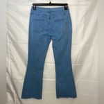 EUC Women’s medium/light wash blue stretch flare leg distressed‎ hem jeans XL Photo 3