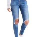 Levi's 721 Ripped Knee High Rise Skinny Jeans Photo 0