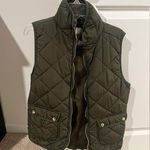 Green vest with gold accessories Photo 0