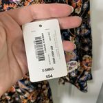 Belle Sky  Size XS Romper Black Floral Flutter Sleeve Deep V-Neck Button Women’s Photo 4