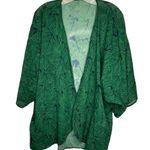 Sheer Polyester Swim Cover Photo 0