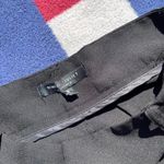 Romeo + Juliet Couture Romeo and Juliet Black dress pants with Red and white stripes at the side Photo 2