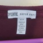 PINK - Victoria's Secret  super soft v-neck short sleeve top with pink on front flowy in burgundy purple and white size small. Photo 4