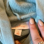 NWT Colsie Top Blue Photo 1