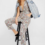 Free People  X Revolve Ruffle Your Feather Floral V-Neck Jumpsuit. Size S Photo 0