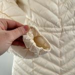 Gallery  Hooded Packable Sustainable Down Feather White Puffer Jacket Size Small Photo 6