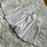 Aritzia  TnAction light lavender tennis mini pleated skort size S Photo 4