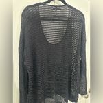 Jennifer Lopez Shimmering Sheer Black V-Neck Sweater Photo 4