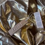 SKIMS  Gold Metallic Mini Skirt Photo 2