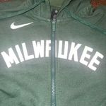 Nike  Green Milwaukee Hoodie woman’s sz M Photo 1