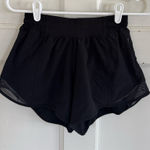 Lululemon  On The Fly black shorts size 4 Tall Photo 0