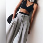 NWT FREE PEOPLE MOVEMENT STUIDO SIREN PANTS COLOR IS BLACK WALNET Size L Photo 0