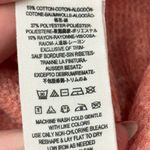 Free People  Coral Peach Oversized Asymmetrical Hem Tunic Sweater Size Medium Photo 9