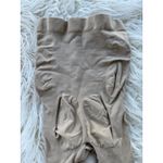 SKIMS Seamless Sculpt High Waisted Mid Thigh Short
Clay Size Small Photo 7