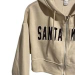 Refuge Cropped Hoodie Women's Size M Full Zip Hooded Jacket Beige Graphic Casual Photo 1