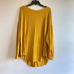 Free People  Yellow Longsleeve open back with Asymmetrical Hem and Relaxed‎ Fit Photo 1
