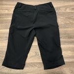 REI ladies outdoor brand Capri style pants. Size: 4. Black Photo 3