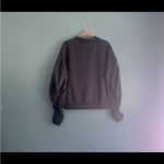 Reebok  black zip up sweatshirt with windbreaker ruffle sleeves women size small‎ Photo 1