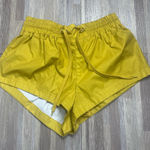 FP Movement Gold Women's Athletic Shorts. Size Small Yellow Photo 0