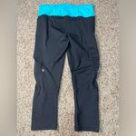 Lululemon  Water Bound Crops Black and Blue Tropics Size 4 Photo 8