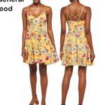 The General Good Yellow Floral Crisscross Spaghetti Strap Tank Dress Photo 0