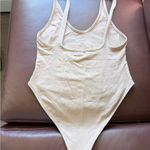 Tiger Mist  Light tan woman’s bodysuit size small Photo 2