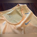 Nike Women’s  running yellow tank top Photo 1