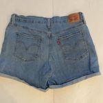 Levi's Levi’s mid length jean shorts Cuffed Light to medium wash Women’s size 30 Photo 3