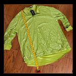 SheIn oversized Lime green satin /sequence buttondown blouse - Size Large-NWT with bag******Refer to measurements. Beautiful green button down blouse with sequins. Can be warn as dress as shown. Never warn & excellent condition. Measurements approximately 25” from armpit to armpit x 25” -29” long. Non-smoking home. priced to sell at as is condition. Don’t like my price, make reasonable offer! And thank you for checking my closet. Photo 9