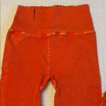Free People NEW! Movement HAPPINESS RUNS Ribbed Bright Orange Leggings M/L Photo 1