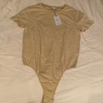 We Wore What  Tee Shirt Bodysuit Photo 0