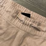 Nike  cream pinkish hue cropped sweat pants size small Photo 2