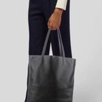 Saks 5th Avenue Saks Fifth Avenue faux leather perforated accent tote bag Photo 0