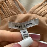 Naked Zebra Peach Top Photo 1