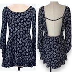 Floral bell sleeve tunic top women's medium blue open back ruffle hem by Phanuel Photo 1