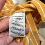 Tommy Hilfiger  gold and white striped tee with navy blue trim size S/P. Photo 5